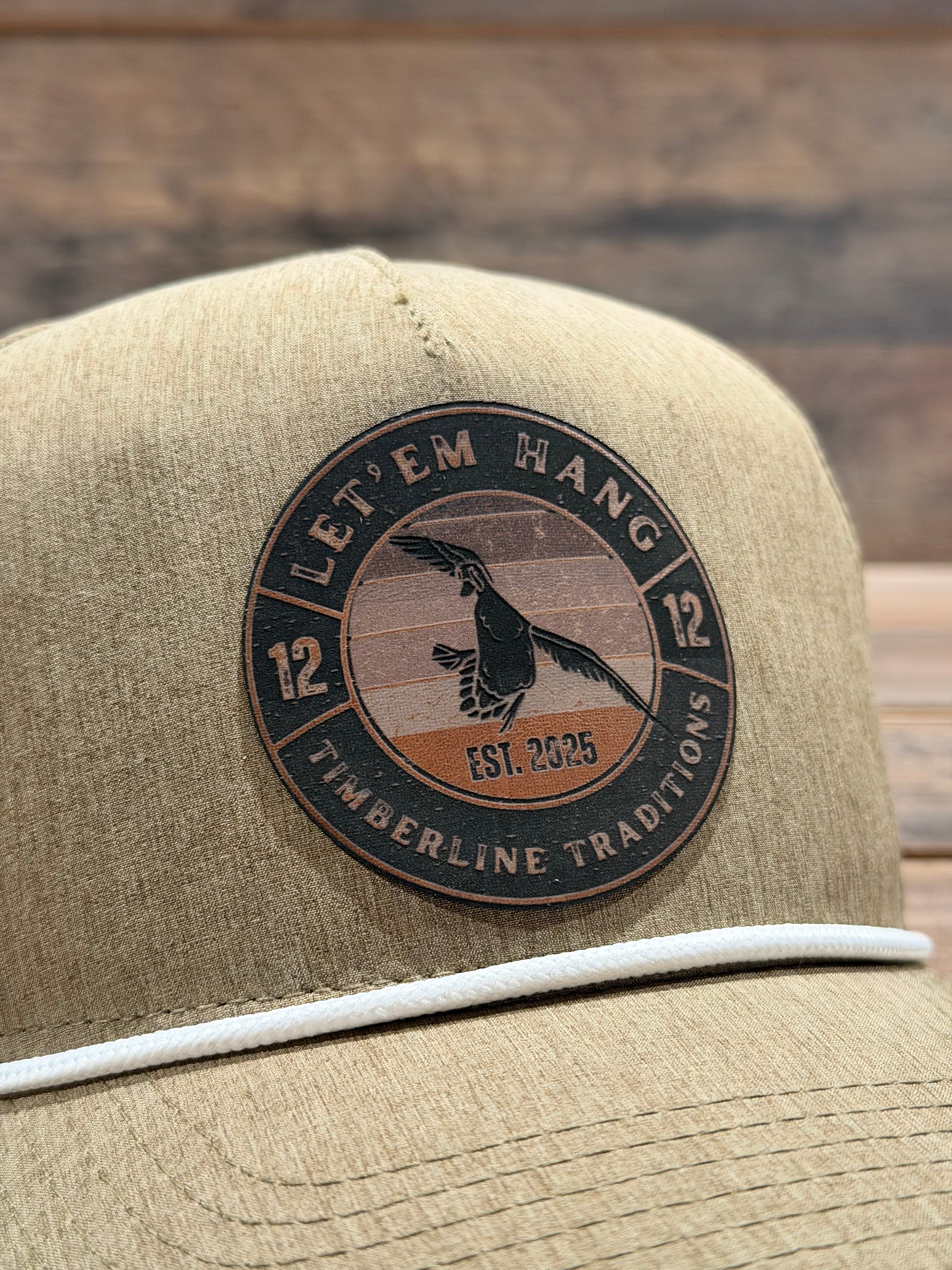 Patch on a jacket with text and a logo, set against a wooden background